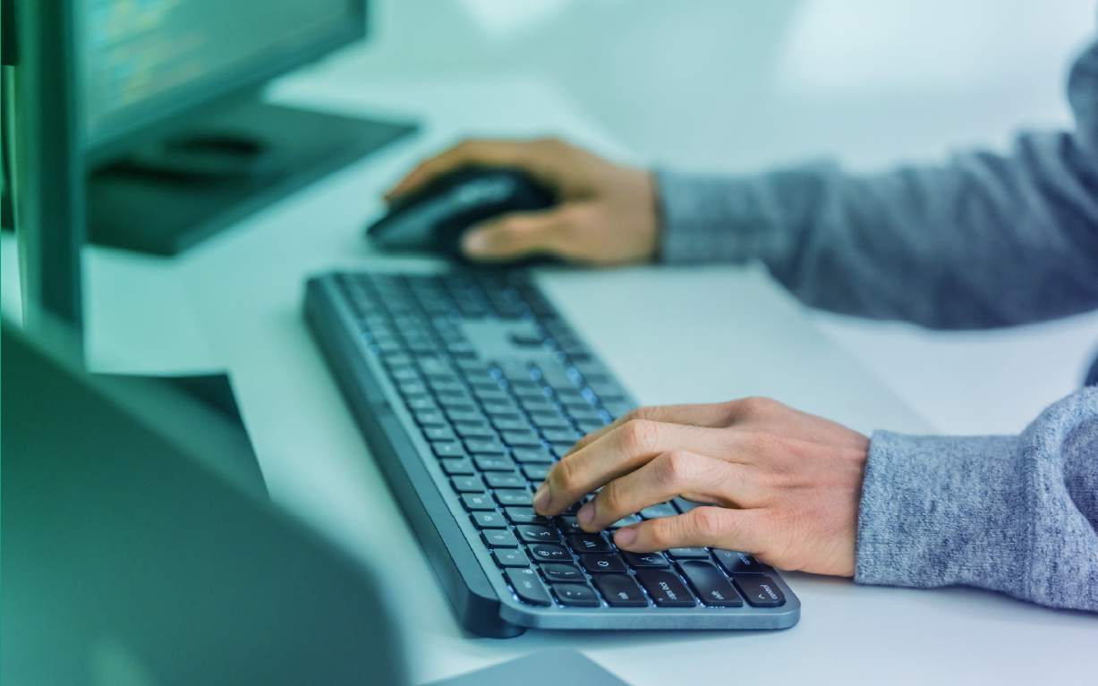 Hands on keyboard reviewing AI generated code